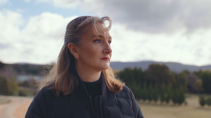 a woman looking away from the camera